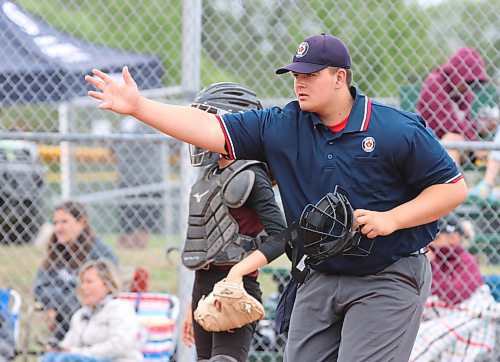 Damien Mathys, shown signalling that a ball is in play, is in just his second year as an umpire but has progressed so rapidly that he&#x2019;s already working a national championship. (Perry Bergson/The Brandon Sun)
Aug. 11, 2023