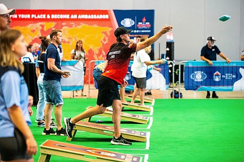 MIKAELA MACKENZIE / WINNIPEG FREE PRESS

Kyle Booth (Kenora EMS) competes in cornhole at the World Police and Fire Games at the RBC Convention Centre on Friday, Aug. 4, 2023. For Ѡstory.
Winnipeg Free Press 2023