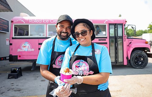 RUTH BONNEVILLE / WINNIPEG FREE PRESS

ENT - Shake N Rolls

Photo of newlyweds, Param and Kulpreet Gill, owners of Shake N Rolls, pink food truck that makes rolled ice cream in many flavours including  Khoya Gulab dish they are holding. 

Shake N Rolls is a new local food truck that has been attracting long lineups for their east Indian-inspired flavours of rolled ice cream.  

Eva Wasney story

August 3rd,  2023

