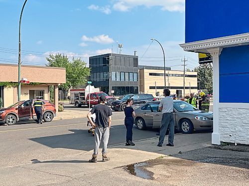Brandon Police Service officers investigate the aftermath of a motor vehicle collision on the 300 block of Princess Avenue late Tuesday afternoon. Police had few details on the incident available except that two vehicles were involved. (Matt Goerzen/The Brandon Sun)