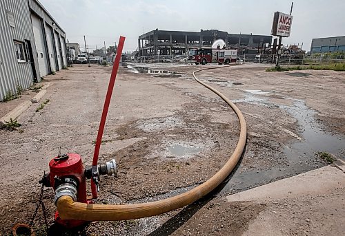 JOHN WOODS / WINNIPEG FREE PRESS
A crew remains on scene at an industrial fire on Logan Ave. in Winnipeg, Monday, August 7, 2023. 

Reporter: