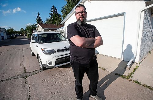 JOHN WOODS / WINNIPEG FREE PRESS
Joshua Murphy, who owns a KIA Soul, is photographed at his home in Winnipeg, Tuesday, August 8, 2023. Murphy is allegedly having trouble getting warranty service from KIA Canada.

Reporter: Gabby