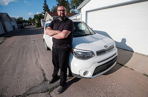 JOHN WOODS / WINNIPEG FREE PRESS
Joshua Murphy, who owns a KIA Soul, is photographed at his home in Winnipeg, Tuesday, August 8, 2023. Murphy is allegedly having trouble getting warranty service from KIA Canada.

Reporter: Gabby