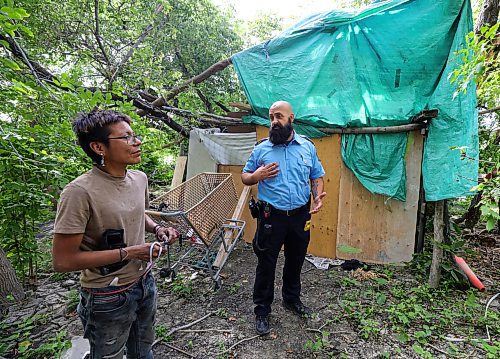 RUTH BONNEVILLE / WINNIPEG FREE PRESS

Local - fire safety at encampments

Visiting a homeless camp with Steven Antle, a WFPS encampment outreach worker, at Fort Douglas Park on Waterfront Drive. 

Photos of Antle spending time walking through the encampment with Kat (Kathy) Smith-Sutherland, who lives in the camp, letting her know  about fire safety measures and how to ensure anyone isn't entrapped by an uncontrolled fire.  

See Erik's story.

August 9th,  2023

