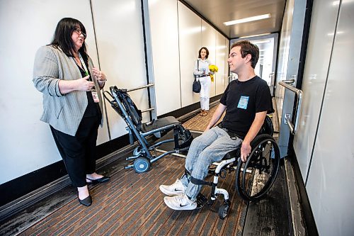 MIKAELA MACKENZIE / WINNIPEG FREE PRESS

Christina Redmond, director of terminal operations with the Winnipeg Airport Authority, shows Luke Armbruster, administrative assistant with Inclusion Winnipeg, the aisle chair during a passenger rehearsal program tour at the Winnipeg Richardson International Airport on Tuesday, Aug. 8, 2023. With this program, travelers with disabilities are invited to check out the security and boarding process before they fly. For Eva Wasney story.
Winnipeg Free Press 2023