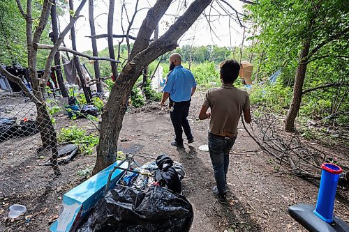 RUTH BONNEVILLE / WINNIPEG FREE PRESS

Local - fire safety at encampments

Visiting a homeless camp with Steven Antle, a WFPS encampment outreach worker, at Fort Douglas Park on Waterfront Drive. 

Photos of Antle spending time walking through the encampment with Kat (Kathy) Smith-Sutherland, who lives in the camp, letting her know  about fire safety measures and how to ensure anyone isn't entrapped by an uncontrolled fire.  

See Erik's story.

August 9th,  2023

