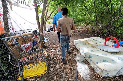 RUTH BONNEVILLE / WINNIPEG FREE PRESS

Local - fire safety at encampments

Visiting a homeless camp with Steven Antle, a WFPS encampment outreach worker, at Fort Douglas Park on Waterfront Drive. 

Photos of Antle spending time walking through the encampment with Kat (Kathy) Smith-Sutherland, who lives in the camp, letting her know  about fire safety measures and how to ensure anyone isn't entrapped by an uncontrolled fire.  

See Erik's story.

August 9th,  2023

