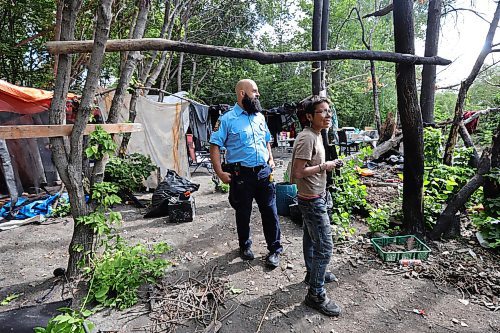 RUTH BONNEVILLE / WINNIPEG FREE PRESS

Local - fire safety at encampments

Visiting a homeless camp with Steven Antle, a WFPS encampment outreach worker, at Fort Douglas Park on Waterfront Drive. 

Photos of Antle spending time walking through the encampment with Kat (Kathy) Smith-Sutherland, who lives in the camp, letting her know  about fire safety measures and how to ensure anyone isn't entrapped by an uncontrolled fire.  

See Erik's story.

August 9th,  2023

