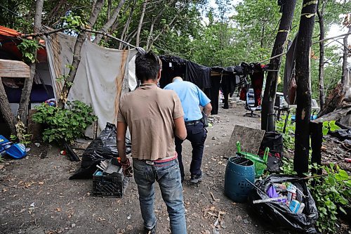 RUTH BONNEVILLE / WINNIPEG FREE PRESS

Local - fire safety at encampments

Visiting a homeless camp with Steven Antle, a WFPS encampment outreach worker, at Fort Douglas Park on Waterfront Drive. 

Photos of Antle spending time walking through the encampment with Kat (Kathy) Smith-Sutherland, who lives in the camp, letting her know  about fire safety measures and how to ensure anyone isn't entrapped by an uncontrolled fire.  

See Erik's story.

August 9th,  2023

