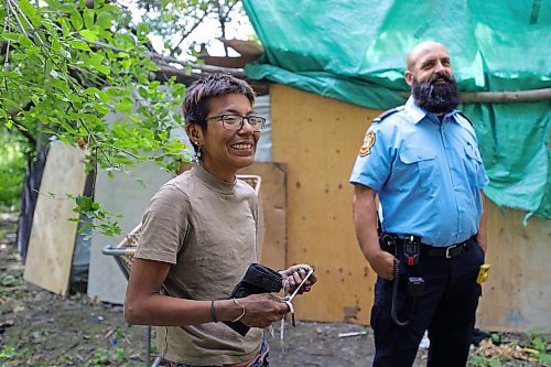 RUTH BONNEVILLE / WINNIPEG FREE PRESS

Local - fire safety at encampments

Visiting a homeless camp with Steven Antle, a WFPS encampment outreach worker, at Fort Douglas Park on Waterfront Drive. 

Photos of Antle spending time walking through the encampment with Kat (Kathy) Smith-Sutherland, who lives in the camp, letting her know  about fire safety measures and how to ensure anyone isn't entrapped by an uncontrolled fire.  

See Erik's story.

August 9th,  2023

