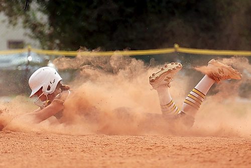 09082023
Kasia Baranyk #3 of the Westman Magic kicks up dust as she dives into third base during a match against the Cloverdale Fury at the U15 Girl's Canadian Fast Pitch Championships at the Ashley Neufeld Softball Complex on Wednesday.
(Tim Smith/The Brandon Sun)