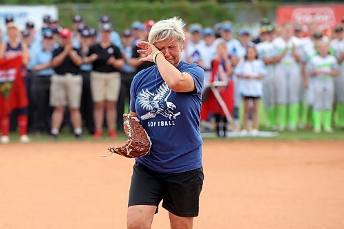 09082023
Bev Neufeld, Host Committee Co-Chair, Westman Magic Assistant Coach and mother of Ashley Neufeld, wipes away tears after throwing out the ceremonial first pitch at the opening ceremonies of the U15 Girl's Canadian Fast Pitch Championships at the Ashley Neufeld Softball Complex in Brandon on Wednesday. Ashley Neufeld and two Dickinson State University softball teammates, Kyrstin Gemar and Afton Williamson, died tragically in November, 2009 when the vehicle they were in drove into a pond near the university in North Dakota. 
(Tim Smith/The Brandon Sun)