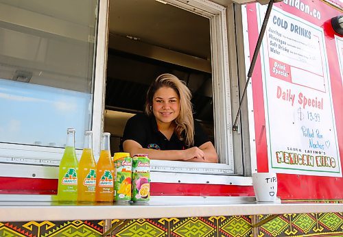 Luisa Rodriguez helps prepare the food and cooks at Sabor Latino restaurant, and runs the Mexican King food truck, parked in the Canadian Tire parking lot. (Photos by Michele McDougall/The Brandon Sun)  