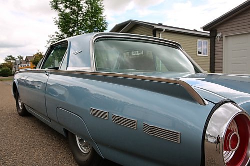 A rear angle of a1962 Ford Thunderbird two-door hardtop, owned by Lianne and Jim Christie, in Brandon on Wednesday. (Michele McDougall/The Brandon Sun)