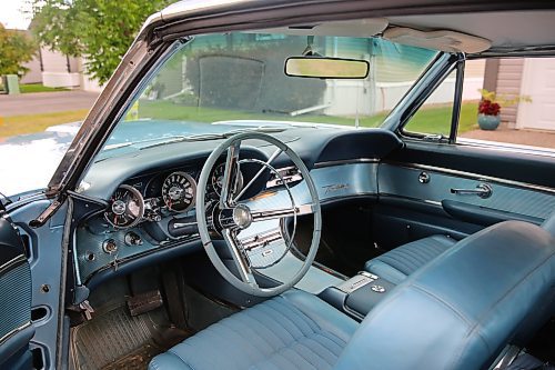 The interior of Lianne and Jim Christie's 1962 Ford Thunderbird two-door hardtop, which features a swing steering wheel, in Brandon on Wednesday. (Michele McDougall/The Brandon Sun)