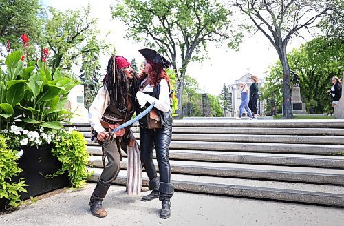 RUTH BONNEVILLE / WINNIPEG FREE PRESS

INTERSECTION - Jack of Wpg

Photos of Todd Douglas, AKA Jack Sparrow, at various iconic spots in Winnipeg including, St-Boniface Cathedral, on the Red River with Esplanade Bridge, at the Forks and next to the Splash Dash boat at the Forks.  

His partner, Corinne Bremner, AKA Mrs. Scarlet, also in one of the photos. 

What: This is for an Intersection piece on Todd's alter-ego, Jack in the Peg. For close to a decade, Douglas, an actor, has hit the town as the Jack Sparrow character from the Pirates of the Caribbean movies. It started off as a Halloween lark, he now gets paid to show up as Jack for b-day parties, work events, restaurant launches, etc.

See Dave Sanderson's story

August 9th,  2023

