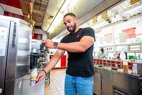 MIKAELA MACKENZIE / WINNIPEG FREE PRESS

BDI owner Justin Jacob serves up a cone of lupin-bean frozen dessert on Thursday, Aug. 10, 2023. This may be the first of its kind in Canada, and is made at the University of Manitoba. For Gabby story.
Winnipeg Free Press 2023.