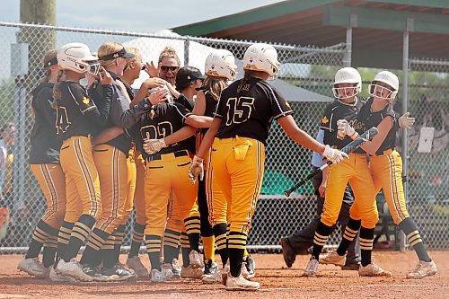 The Westman Magic celebrate their 5-4 win over the Moose Jaw Ice at the under-15 softball nationals at the Ashley Neufeld Softball Complex on Friday. Westman split its games on Friday to finish pool play 2-3 and out of the running for the national title. (Tim Smith/The Brandon Sun)