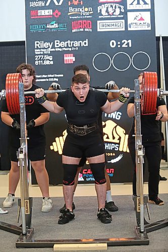 Ste. Rose product Riley Bertrand makes a face just moments before attempting to lift 277.5 kg during the 2023 Powerlifting Championship at Brandon University's Healthy Living Centre on Friday afternoon.  (Matt Goerzen/The Brandon Sun)