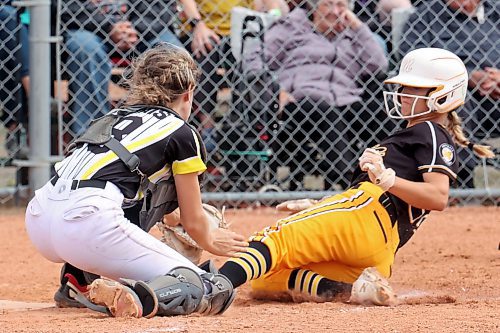 11082023
Kendra Grift #22 of the Westman Magic slides into home plate but is tagged out by Blake Maltais #88 of the Moose Jaw Ice during a match at the U15 Girl's Canadian Fast Pitch Championships at the Ashley Neufeld Softball Complex on Friday.
(Tim Smith/The Brandon Sun)
