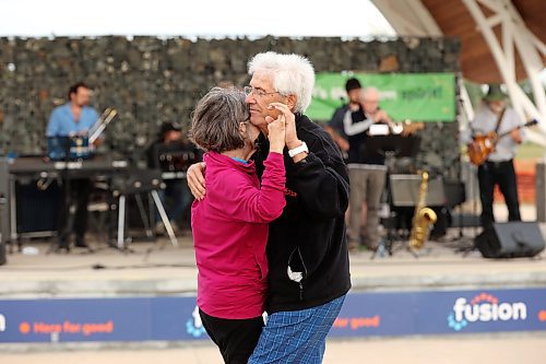 11082023
Johanna Leseho and Franz Wachs dance as the Jakeleg Blues Band performs at the Fusion Credit Union Stage during RibFest at the Riverbank Discovery Centre on Friday evening.
(Tim Smith/The Brandon Sun)