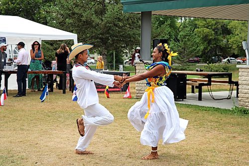 Daniela Sanchez and Melvin Hernandez perform a Honduran folk dance at the First HAMI Hispanic Festival at Rideau Park on Saturday. (Colin Slark/The Brandon Sun)