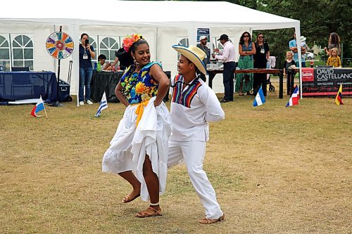 Daniela Sanchez and Melvin Hernandez perform a Honduran folk dance at the First HAMI Hispanic Festival at Rideau Park on Saturday. (Colin Slark/The Brandon Sun)