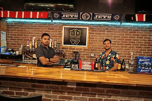 Niral Patel and Darpan Patel, the owners of Guinness Tavern by the Double Decker. (Abiola Odutola/The Brandon Sun)
