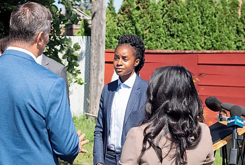 Mike Thiessen / Winnipeg Free Press 
Uzoma Asagwara, NDP MLA for Union Station, speaks with fellow candidates after the NDP press conference on healthcare promises. For Danielle Da Silva. 230814 &#x2013; Monday, August 14, 2023