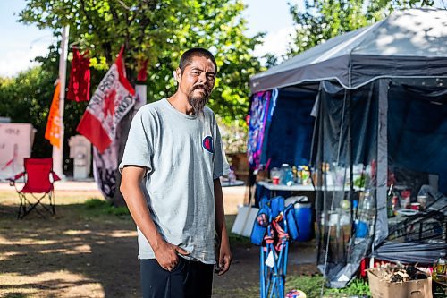 MIKAELA MACKENZIE / WINNIPEG FREE PRESS

Firekeeper Shining Goldstar at Camp Marcedes (beside the Canadian Museum for Human Rights) on Monday, Aug. 14, 2023. For Cierra Bettens story.
Winnipeg Free Press 2023