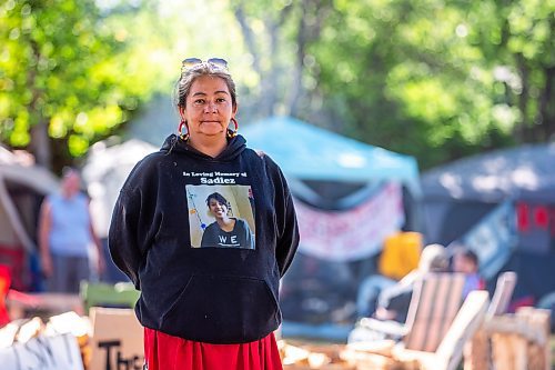 MIKAELA MACKENZIE / WINNIPEG FREE PRESS

Pamela Myran, mother of Marcedes Myran, at Camp Marcedes (beside the Canadian Museum for Human Rights) on Monday, Aug. 14, 2023. For Cierra Bettens story.
Winnipeg Free Press 2023