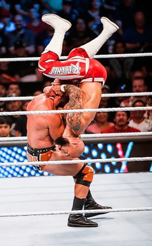 JOHN WOODS / WINNIPEG FREE PRESS
Ricochet flips as he and Ciampa perform at WWE in Winnipeg, Monday, August 14, 2023. 

Reporter: mcintyre