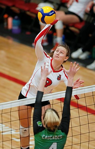 JOHN WOODS / WINNIPEG FREE PRESS
University of Winnipeg Wesmen&#x2019;s Emma Parker (9) goes up for the spike against Fraser Valley Cascades&#x2019; Mo Likness (4) in the third round of the Canada West quarter-final series Sunday, February 26, 2023. 

Re: sawatzky