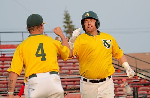 GW Vacuum Truck Service Young Guns Jason Rae, right, celebrates a home run against the RFNOW Cardinals during Game 5 of the Andrew Agencies Senior AA Baseball League final against the at Andrews Field on Tuesday evening. (Thomas Friesen/The Brandon Sun)