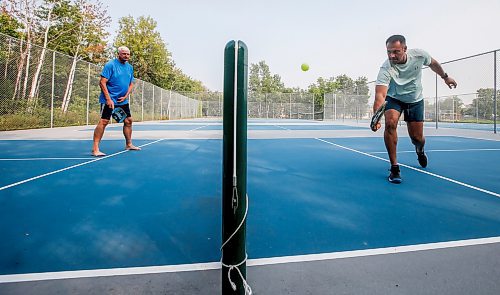 JOHN WOODS / WINNIPEG FREE PRESS
Entrepreneurs Ted Fardoe , left and Nicholas Rush, are photographed at the La Flche Park pickle ball courts in Winnipeg, Tuesday, August 15, 2023. The men are researching the feasibility of a pickleball facility in Winnipeg.

Reporter: sawatzky