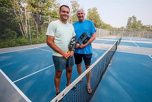 JOHN WOODS / WINNIPEG FREE PRESS
Entrepreneurs Ted Fardoe , right, and Nicholas Rush, are photographed at the La Flche Park pickle ball courts in Winnipeg, Tuesday, August 15, 2023. The men are researching the feasibility of a pickleball facility in Winnipeg.

Reporter: sawatzky