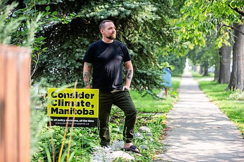 MIKAELA MACKENZIE / WINNIPEG FREE PRESS

Rusty Robot, a local music producer and musician who has decided to forego his music work this fall to volunteer with Climate Action Manitoba, at his home on Aug. 15, 2023. For Ben Waldman story.
Winnipeg Free Press 2023