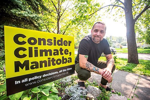 MIKAELA MACKENZIE / WINNIPEG FREE PRESS

Rusty Robot, a local music producer and musician who has decided to forego his music work this fall to volunteer with Climate Action Manitoba, at his home on Aug. 15, 2023. For Ben Waldman story.
Winnipeg Free Press 2023