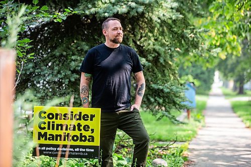 MIKAELA MACKENZIE / WINNIPEG FREE PRESS

Rusty Robot, a local music producer and musician who has decided to forego his music work this fall to volunteer with Climate Action Manitoba, at his home on Aug. 15, 2023. For Ben Waldman story.
Winnipeg Free Press 2023