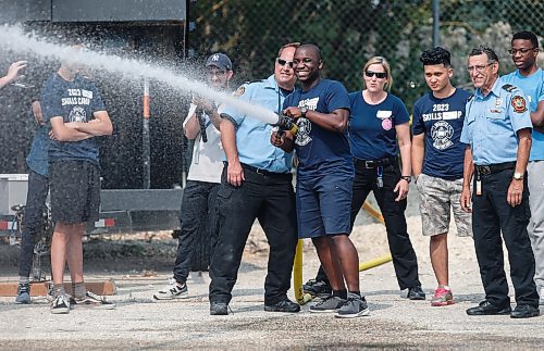 JOHN WOODS / WINNIPEG FREE PRESS
Michael Saliu learns the ropes at the Winnipeg Fire Paramedic Service (WFPS) training academy in Winnipeg, Tuesday, August 15, 2023. The WFPS hosted 36 newcomer youth at a two-day skills training career camp.

Reporter: cierra