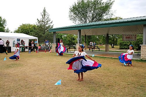 Honduran dancers perform at the First HAMI Hispanic Festival at Rideau Park on Saturday. (Colin Slark/The Brandon Sun)