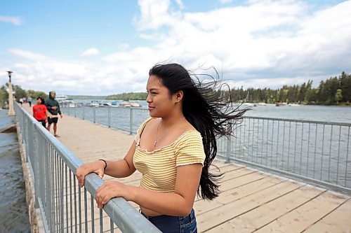 16082023
The strong wind blows through the hair of Sofia Asejo on her fourteenth birthday while she looks out from the pier at the Clear Lake Marina in Wasagaming during a family trip to Riding Mountain National Park on Wednesday. (Tim Smith/The Brandon Sun)