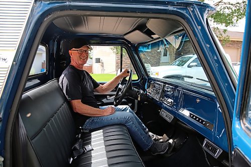 Brandon's Bruce Newitt in the cab of his restored 1966 Chevy C-10 Fleetside pickup truck in the Wheat City on Wednesday. (Photos by Michele McDougall/The Brandon Sun)  
