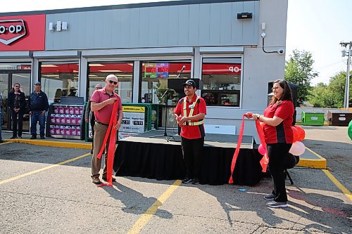 (Left to right) Heritage Co-op Board Member Brad Ross, Rosser Gas Bar Manager Imran Shaik Mohammed and Sixth Street Gas Bar Manager Tracy Mohr jointly cut the ribbon to officially mark the opening of the new gas station. (Photos by Abiola Odutola/The Brandon Sun)