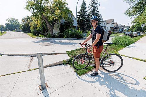 MIKE DEAL / WINNIPEG FREE PRESS
Evan Krosney commutes with his bike everyday and has to contend with this dangerous part of the bike path that joins up with Hallet Street in Point Douglas.
See Joyanne Pursaga story
230817 - Thursday, August 17, 2023.