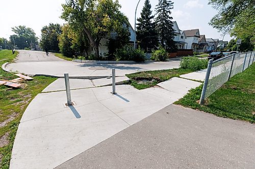 MIKE DEAL / WINNIPEG FREE PRESS
The damaged bike path that joins up with Hallet Street in Point Douglas.
See Joyanne Pursaga story
230817 - Thursday, August 17, 2023.