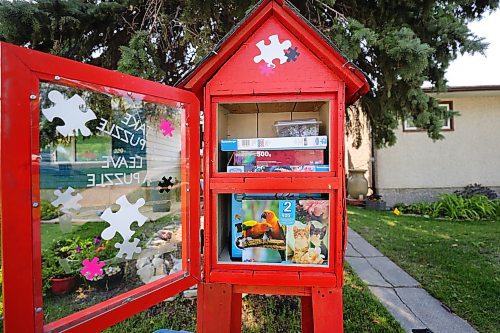 RUTH BONNEVILLE / WINNIPEG FREE PRESS

Local -  Puzzle swap 

Photo of the little puzzle library in front of the  home of Cori Toews  in St. Vital. 

STORY, LITTLE PUZZLE LIBRARY:  (the size of a tiny book library) that recently opened on Wales Avenue in St. Vital. 

Interviewed Cori Toews who has over 200 puzzles on shelves in her basement with 10-15 puzzles in the library nook outside her home. She says 3-6 people look through the puzzle library daily and it's given her an opportunity to connect with her neighbours. 

Story - TESSA, 

August 17th, 2023

