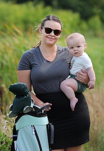 RUTH BONNEVILLE / WINNIPEG FREE PRESS

Sports - Baby and golf course

Photo of Heather Worth with her 7-month-old son, Madden and her golf clubs near her home in Lorette.

Story is about how she was kicked off a golf course yesterday because she had her 7-month-old child with her. 

See story by Josh

August 18th, 2023

