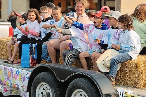 Members of Virden’s Rhythm and Glue program entertain the crowd, and themselves, with bubbles during Saturday’s Virden Indoor Rodeo and Wild West Daze parade. (Kyle Darbyson/The Brandon Sun)