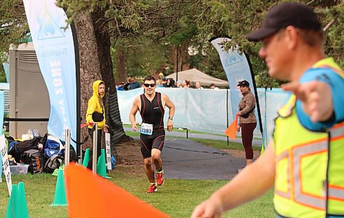 Otto Santizo Lepe (2393) is guided out of transition onto the run course by volunteers during the Riding Mountain Triathlon in Wasagaming on Saturday morning. (Perry Bergson/The Brandon Sun)
Aug. 19, 2023